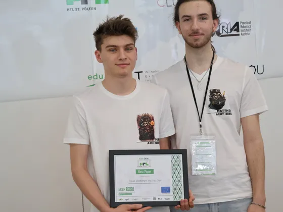 Tobias Madlberger und Matthias Greil mit dem Best Paper Award bei der ECER 2026